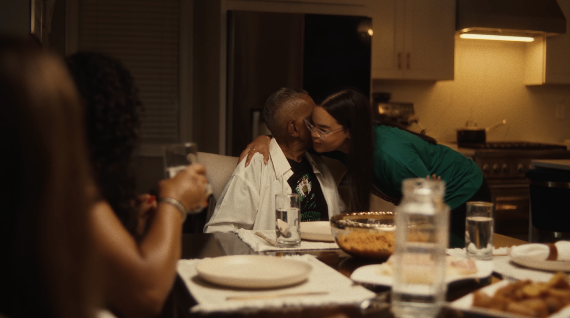 Family dinner, an embrace at the table