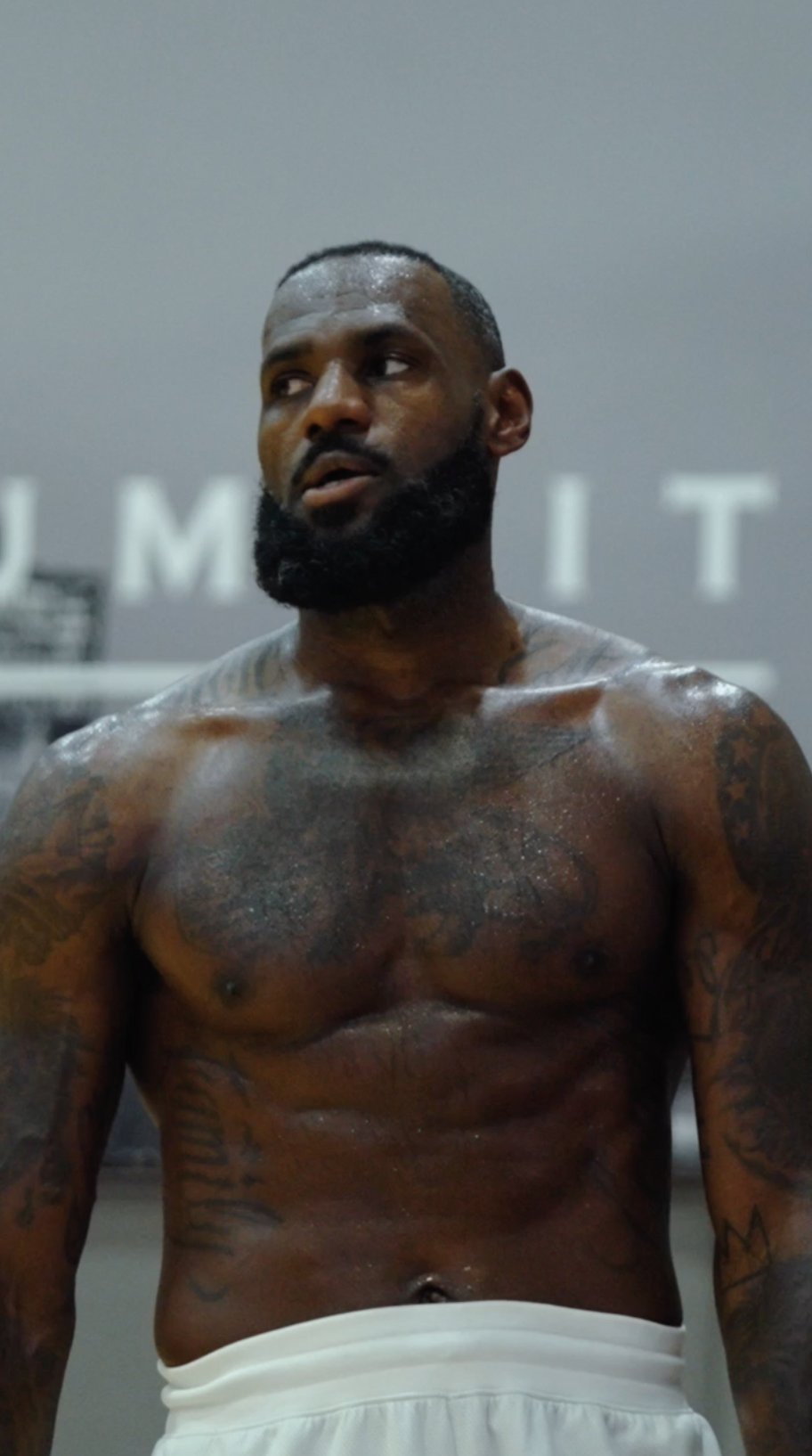 Shirtless portrait of a player at the Summit gym
