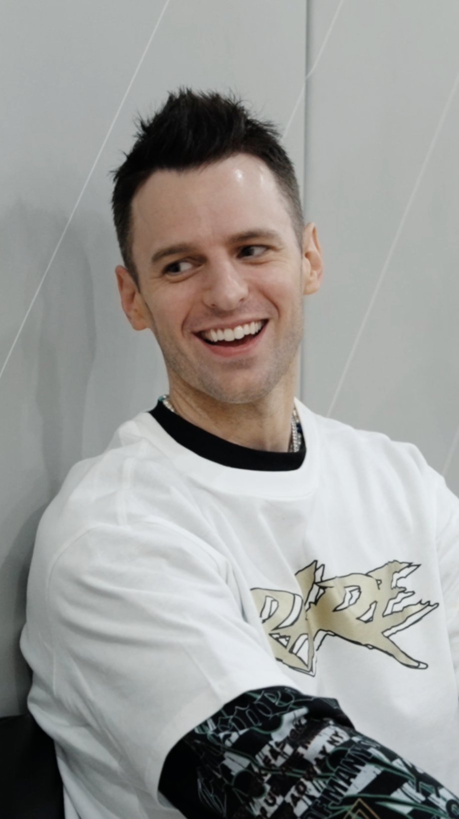 Chris Brickley laughing, close-up portrait