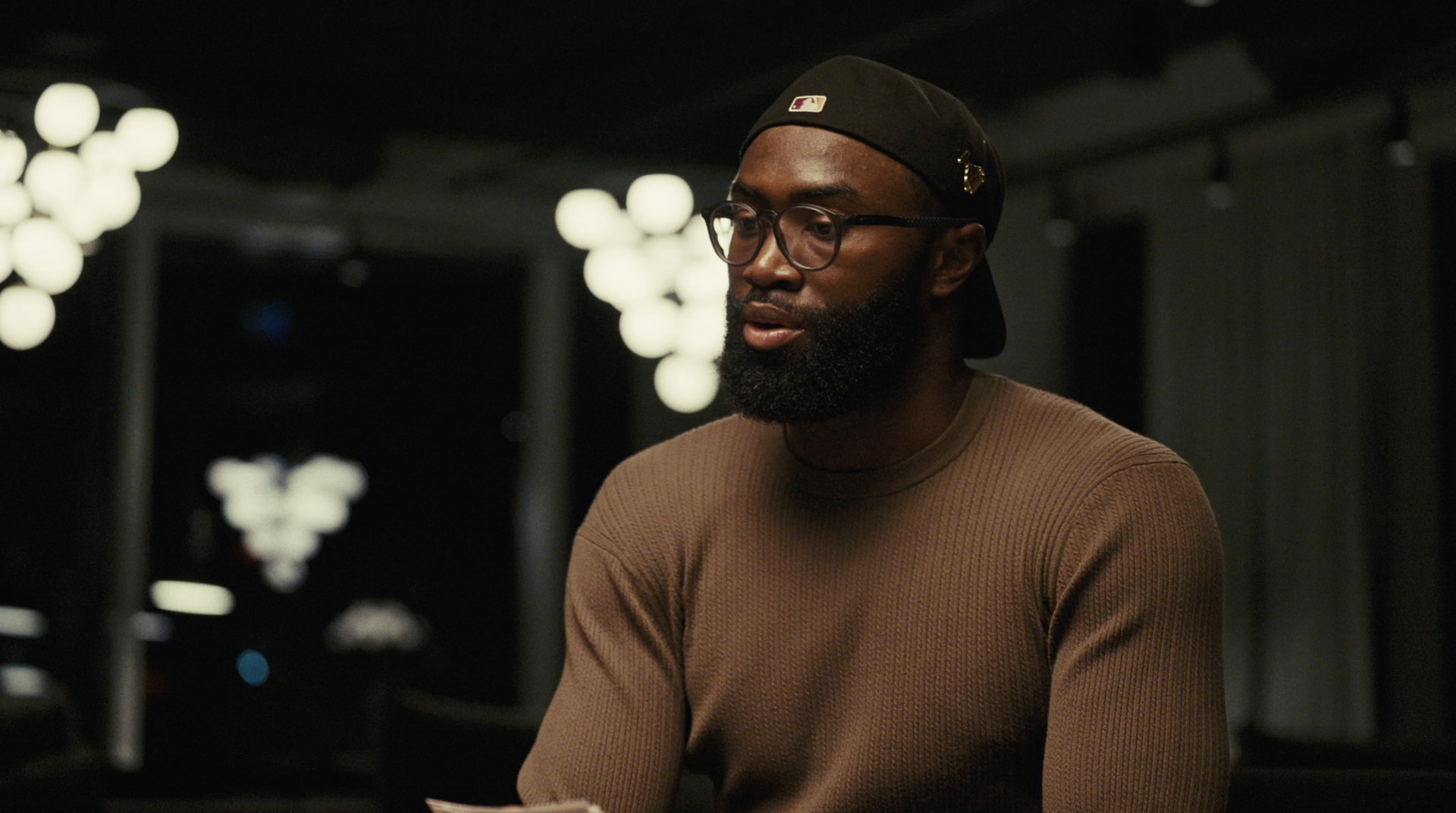 Jaylen Brown in conversation, side angle